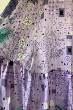 Sylvia Wrap Dress - Vintage Indian Sari - Purple Dusk & Aqua Floral (S/M) 16 Sylvia Wrap Dress - Vintage Indian Sari - Purple Dusk & Aqua Floral (S/M) -KIKIS Clothing Shop Closeupshotofaverysmallfaintrustedcolourmarkatthebottomfrillofthedress