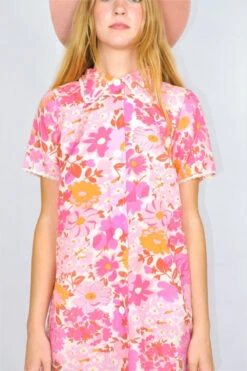 Vintage Dress - Retro Pink Floral Button Up - Free Size M 7 Vintage Dress - Retro Pink Floral Button Up - Free Size M -KIKIS Clothing Shop close up shot of pink frilly shirt shift dress floral pattern in detail all about audrey