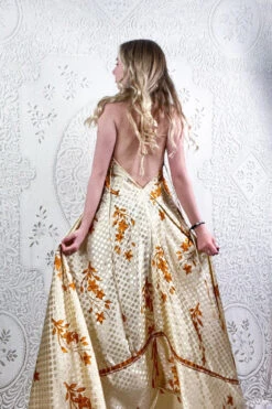Eden Halter Maxi Dress - Vintage Sari - Cream & Amber Peacock Floral - Free Size S/M -KIKIS Clothing Shop model wearing boho chic maxi halter dress hippie style handmade from recycled vintage 70s indian sari all about audrey 242