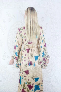 Venus Maxi Dress - Vintage Sari - Sandstone Shimmer Floral - Size S/M -KIKIS Clothing Shop model wearing boho frilly bell sleeve maxi dress hippie long sleeve wrap dress handmade from recycled vintage 1970s indian sari by all about audrey 100