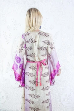 Venus Maxi Dress - Vintage Sari - Pearl, Mauve & Magenta Motif - Size S/M 7 Venus Maxi Dress - Vintage Sari - Pearl, Mauve & Magenta Motif - Size S/M -KIKIS Clothing Shop model wearing boho frilly bell sleeve maxi dress hippie long sleeve wrap dress handmade from recycled vintage 1970s indian sari by all about audrey 28