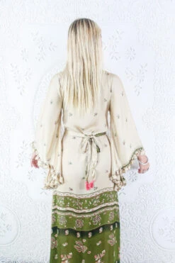 Venus Maxi Dress - Vintage Sari - Ecru & Olive Retro Floral - Size S/M 10 Venus Maxi Dress - Vintage Sari - Ecru & Olive Retro Floral - Size S/M -KIKIS Clothing Shop model wearing boho frilly bell sleeve maxi dress hippie long sleeve wrap dress handmade from recycled vintage 1970s indian sari by all about audrey 31 d660abb4 6421 46f0 ad17 e4ff478d1428