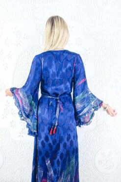 Venus Maxi Dress - Vintage Sari - Deep Blue Apple Print - Size S 5 Venus Maxi Dress - Vintage Sari - Deep Blue Apple Print - Size S -KIKIS Clothing Shop model wearing boho frilly bell sleeve maxi dress hippie long sleeve wrap dress handmade from recycled vintage 1970s indian sari by all about audrey 34
