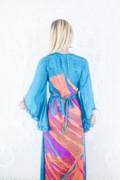 Venus Maxi Dress - Vintage Sari - Ocean Teal & Fiery Orange Stripe - Size S 6 Venus Maxi Dress - Vintage Sari - Ocean Teal & Fiery Orange Stripe - Size S -KIKIS Clothing Shop model wearing boho frilly bell sleeve maxi dress hippie long sleeve wrap dress handmade from recycled vintage 1970s indian sari by all about audrey 61