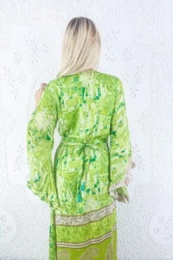Venus Maxi Dress - Vintage Sari - Chartreuse Green & Pine Abstract - Size L/XL -KIKIS Clothing Shop model wearing boho frilly bell sleeve maxi dress hippie long sleeve wrap dress handmade from recycled vintage 1970s indian sari by all about audrey 85