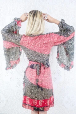 Venus Vintage Sari Midi Dress - Midnight & Rosehip Swirl - Size S/M 7 Venus Vintage Sari Midi Dress - Midnight & Rosehip Swirl - Size S/M -KIKIS Clothing Shop model wearing boho frilly bell sleeve midi dress hippie long sleeve short wrap dress handmade from recycled vintage 1970s indian sari by all about audrey 24