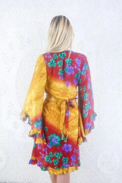 Venus Vintage Sari Midi Dress - Earth Tone Sunset & Jade Floral - Size S -KIKIS Clothing Shop model wearing boho frilly bell sleeve midi dress hippie long sleeve short wrap dress handmade from recycled vintage 1970s indian sari by all about audrey 44