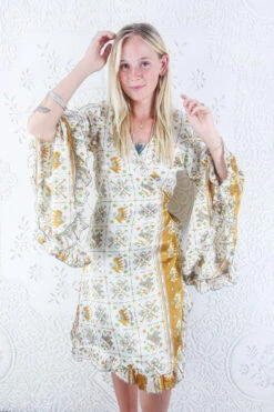 KIKIS Clothing Shop -KIKIS Clothing Shop model wearing boho frilly bell sleeve midi dress hippie long sleeve short wrap dress handmade from recycled vintage 1970s indian sari by all about audrey 63
