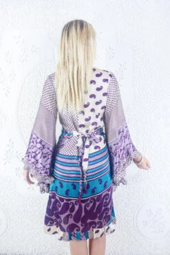 Venus Vintage Sari Midi Dress - Ivory & Royal Purple Paisley - Size S/M 9 Venus Vintage Sari Midi Dress - Ivory & Royal Purple Paisley - Size S/M -KIKIS Clothing Shop model wearing boho frilly bell sleeve midi dress hippie long sleeve short wrap dress handmade from recycled vintage 1970s indian sari by all about audrey 74