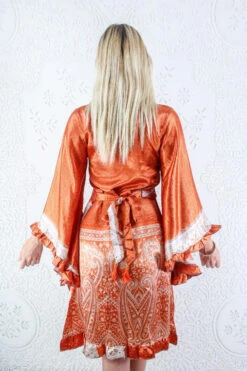 Venus Vintage Sari Midi Dress - Burnt Orange & Pearl Floral Tile - Size S/M 7 Venus Vintage Sari Midi Dress - Burnt Orange & Pearl Floral Tile - Size S/M -KIKIS Clothing Shop model wearing boho frilly bell sleeve midi dress hippie long sleeve short wrap dress handmade from recycled vintage 1970s indian sari by all about audrey 9 d875b2a4 a7b8 41bd 9ada a91ce215bdba